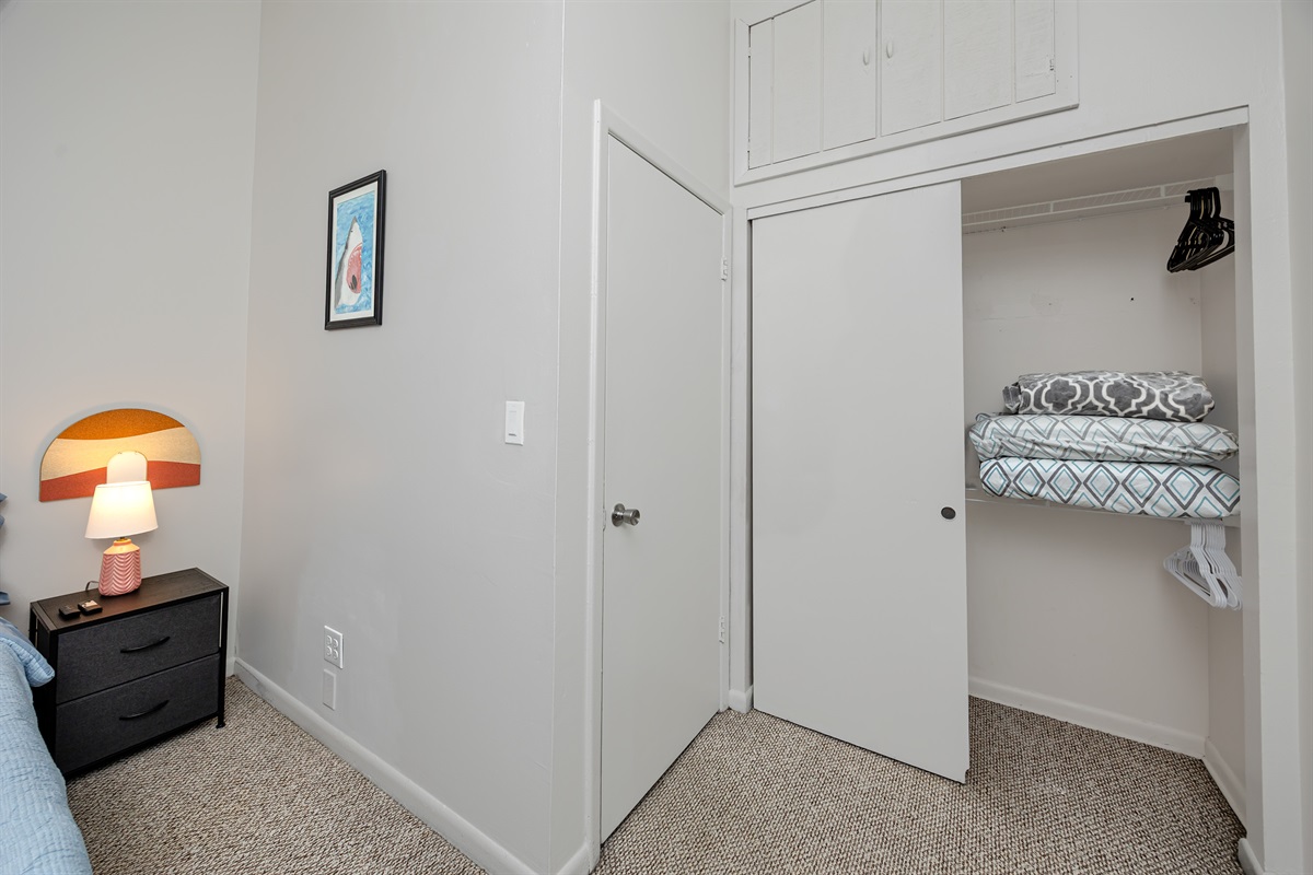 Extra pillows and blankets in closet