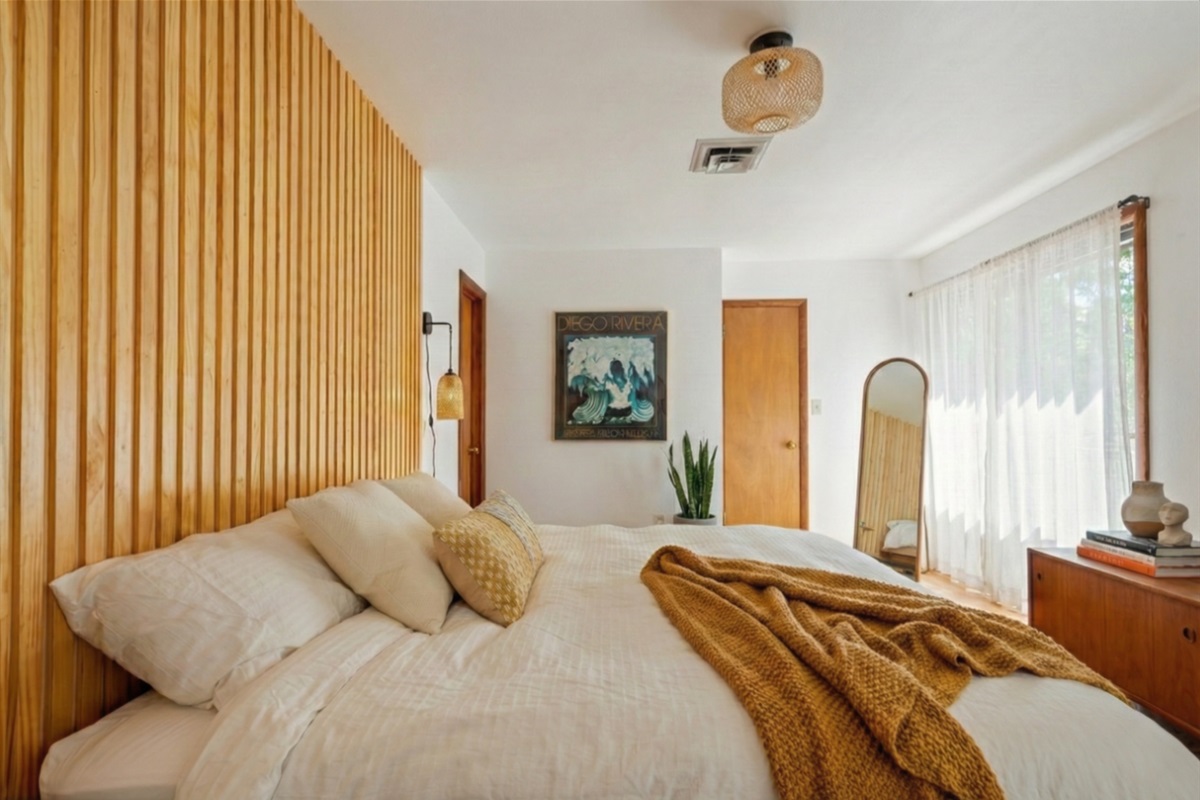 Master bedroom: King bed, 65" TV, Ensuite luxury bathroom, Blackout curtains