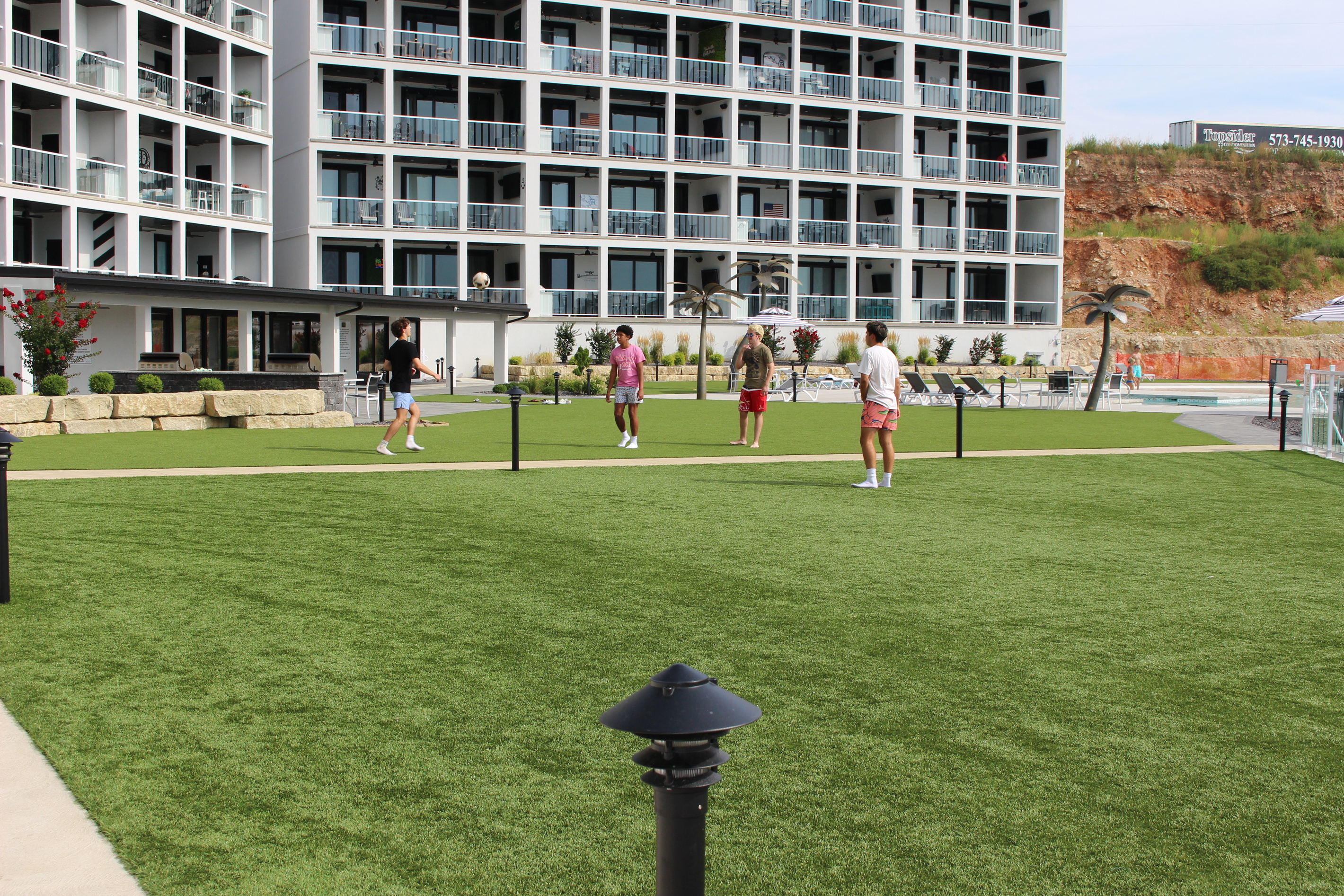 The common area is astro turf for recreational games.