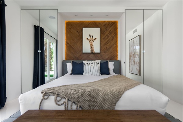 Front Bedroom with walnut herringbone accent wall