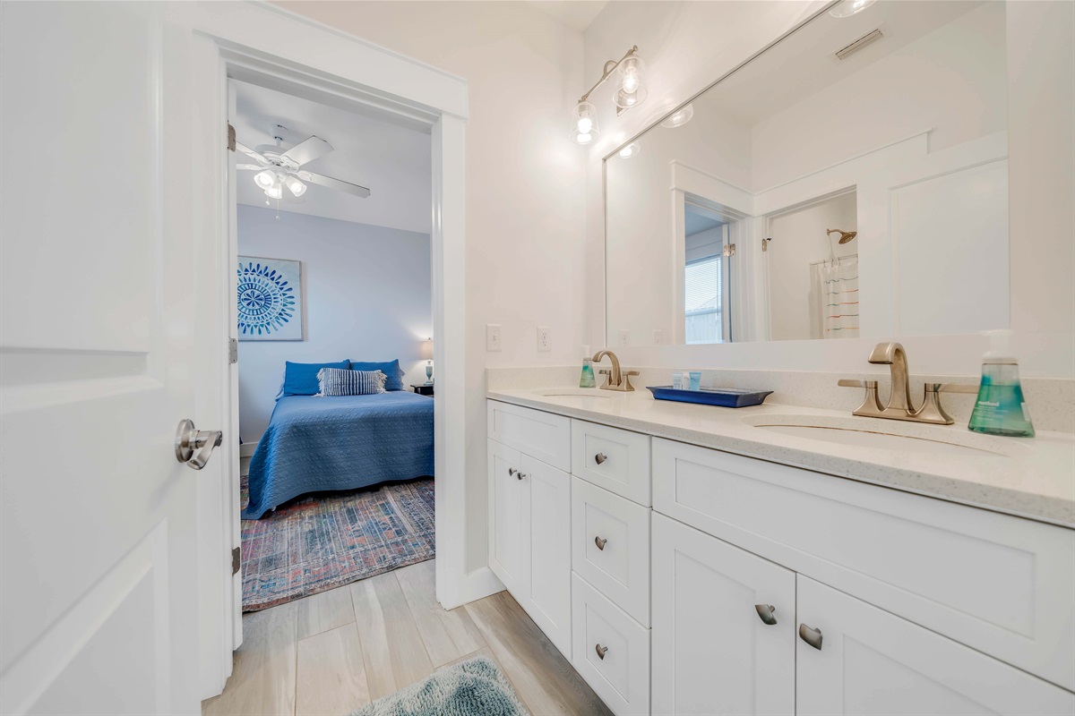 This guest bathroom offers a quiet space to refresh before your dinner plans.