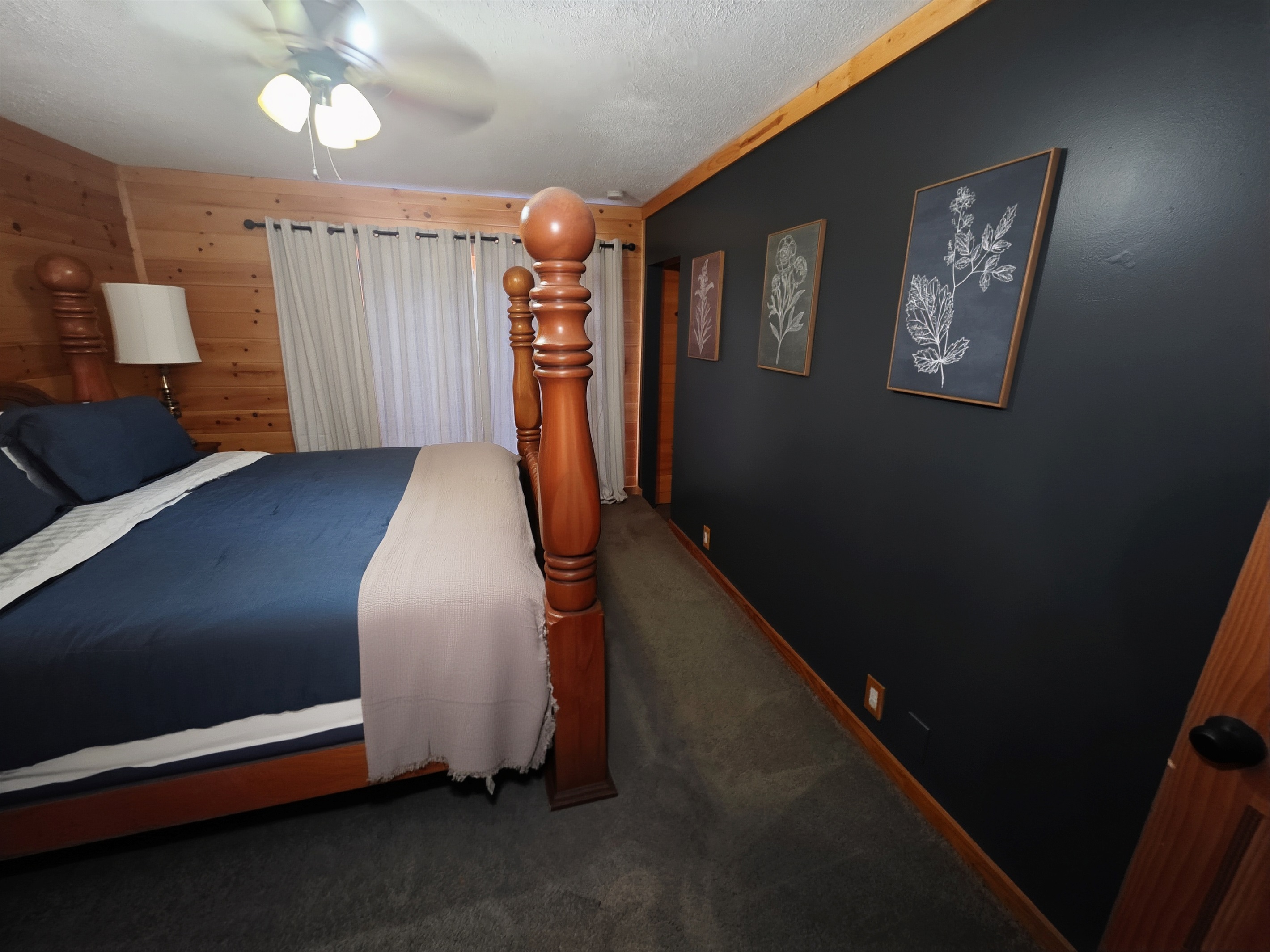 Freshly Painted Master King Bedroom with Ensuite Bathroom and Sliding Doors that lead directly to Hot Tub
