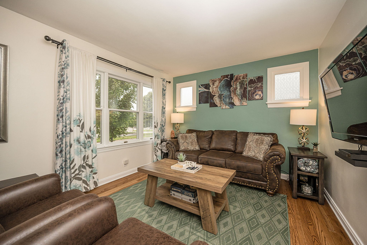 Natural light fills the cozy living room throughout the day.