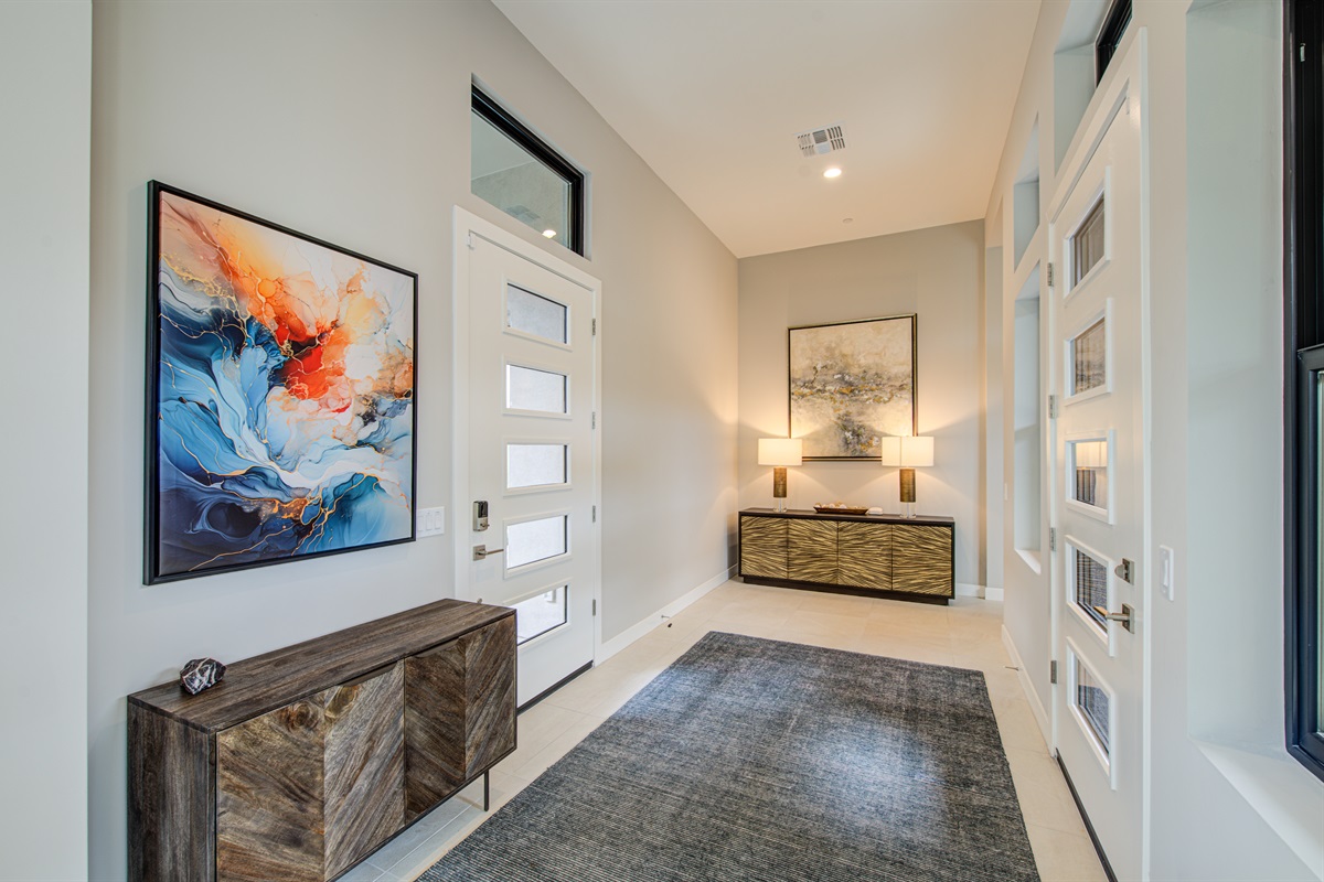 You can feel the start of an exclusive vacation through this unique entryway from the courtyard.