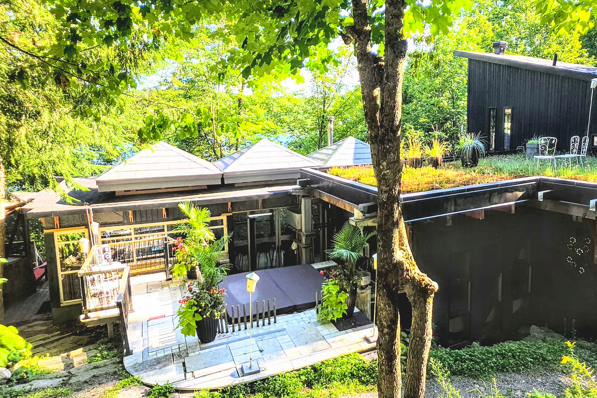 Main cottage overhead view from Tea House showing green roof