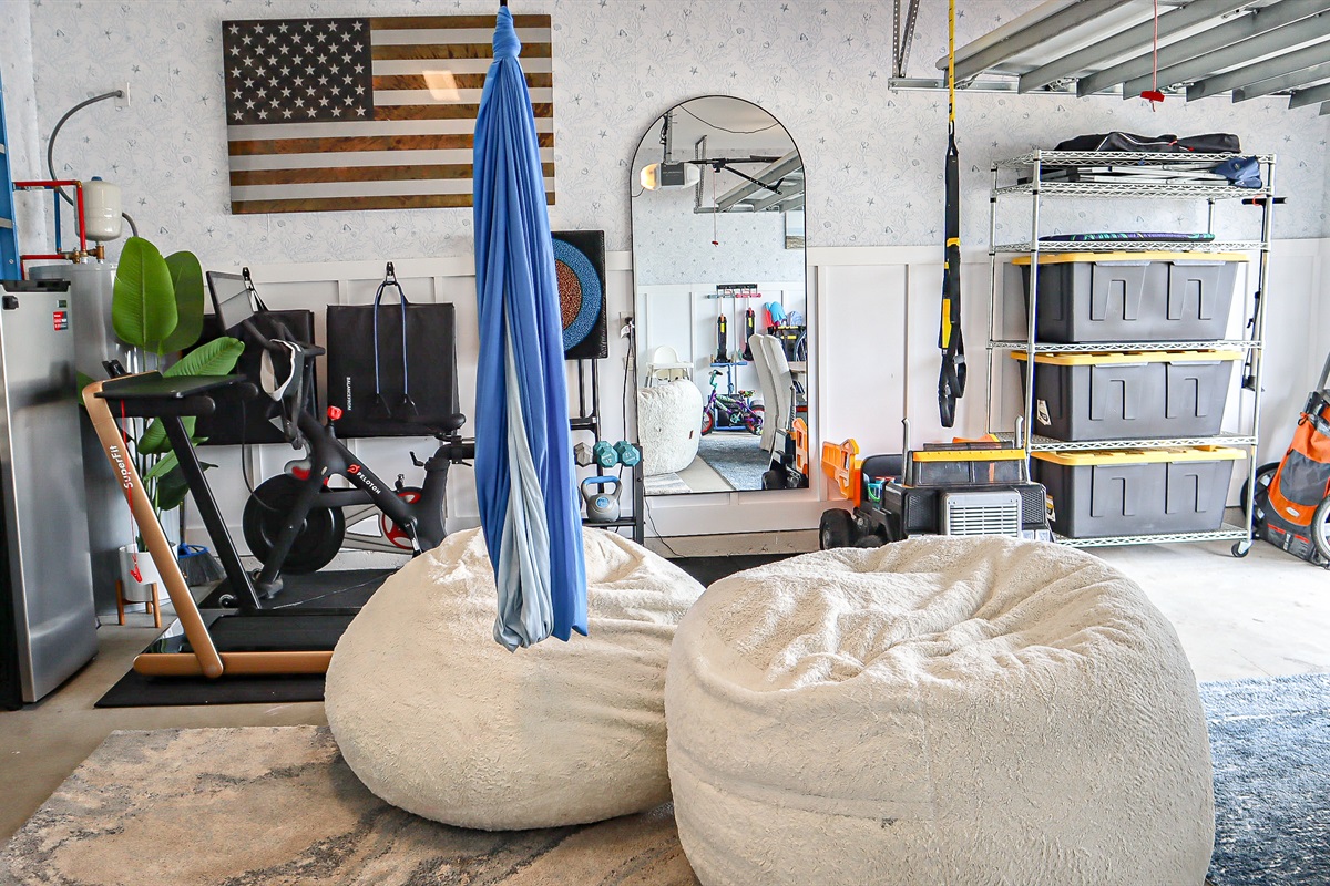 Treadmill, Peloton, TRX, mats and free weights provided for guest use.  Sensory Swing available for child use.