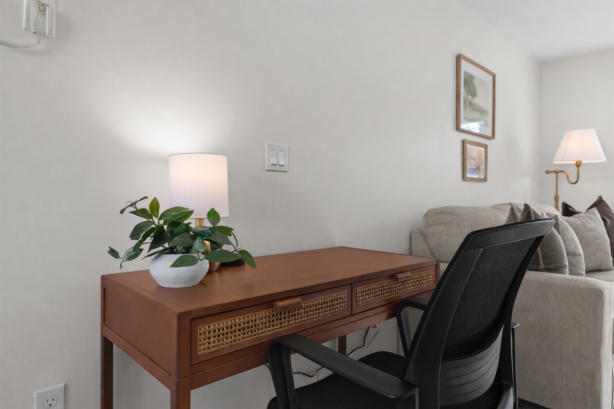 Dedicated workspace with a comfortable desk, task lighting, and a calm setting—ideal for remote work or catching up during your stay.