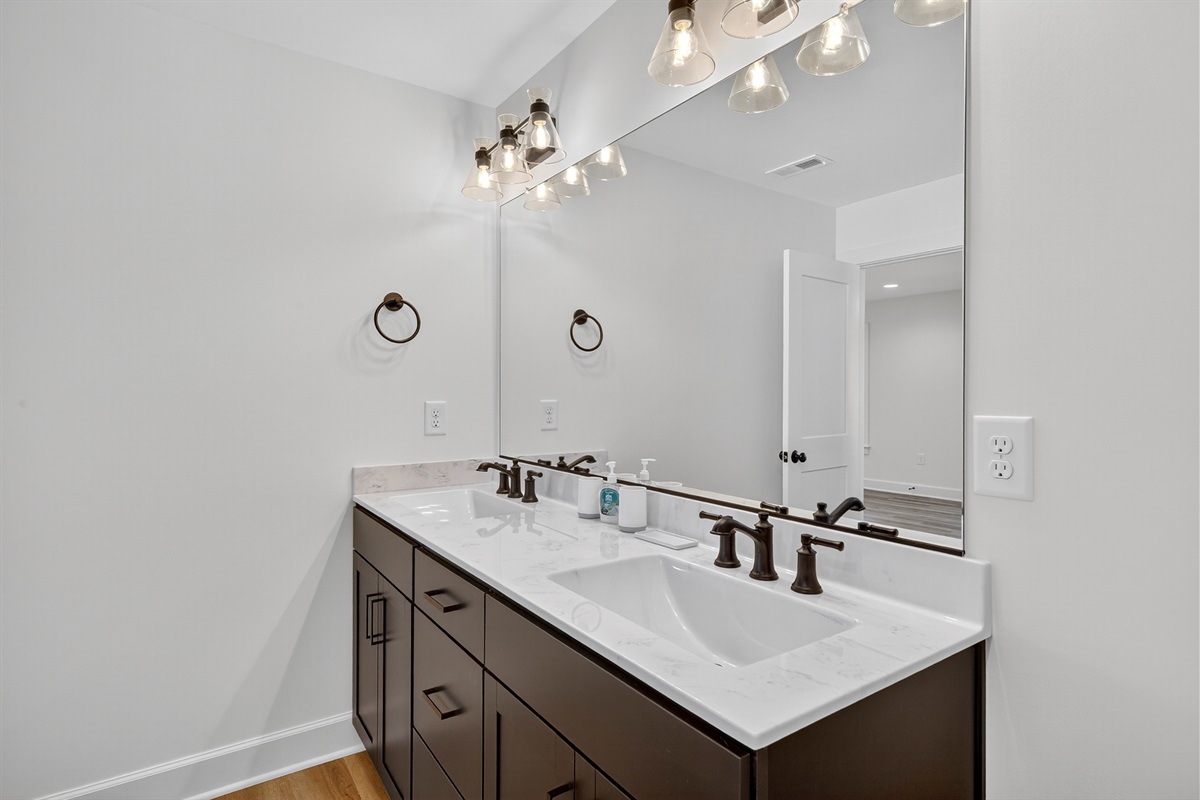 Spacious dual vanity for convenience and style, perfect for morning routines.