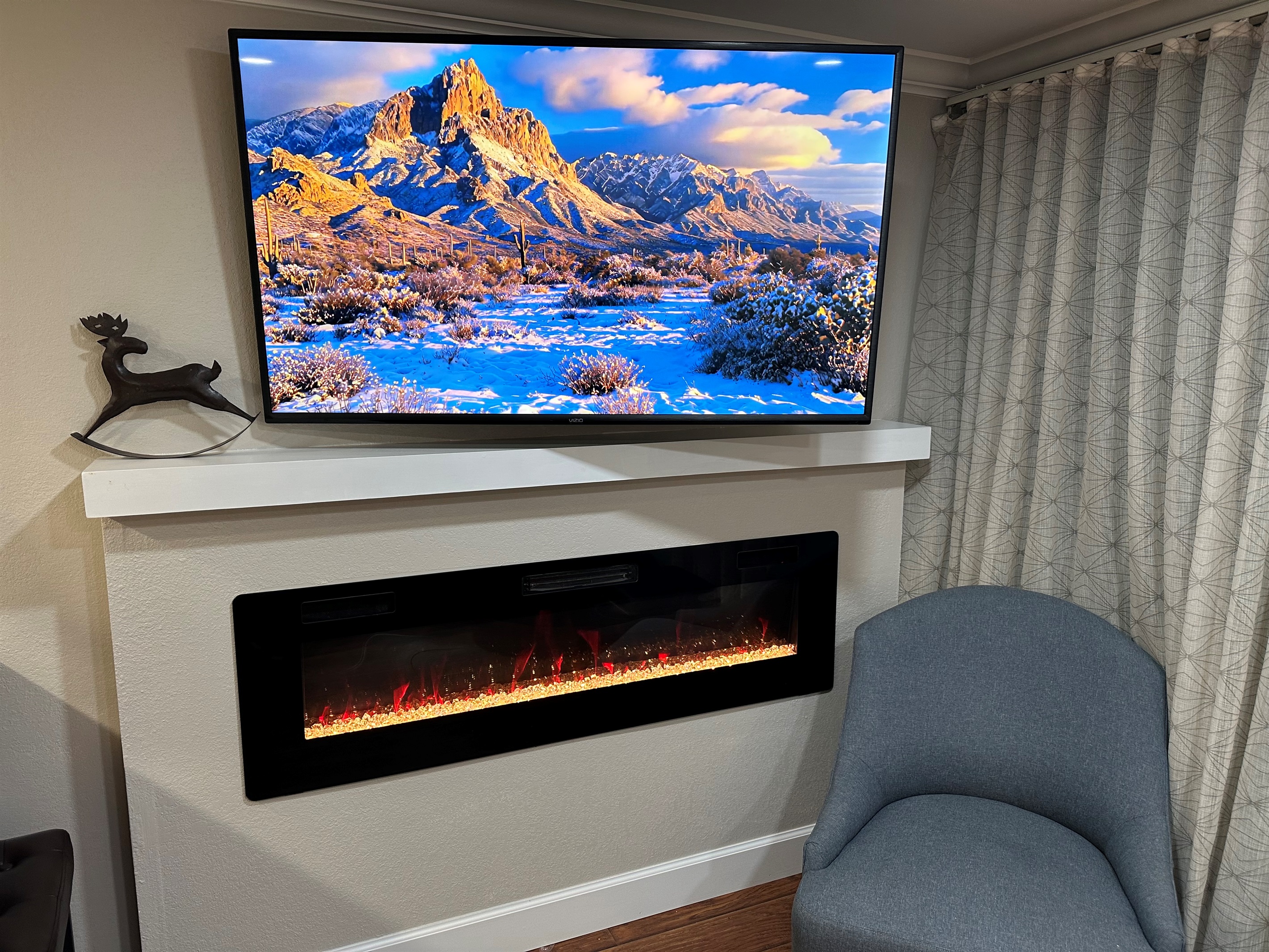 Electric Fireplace to keep you warm.  58" Smart TV for the big game. 