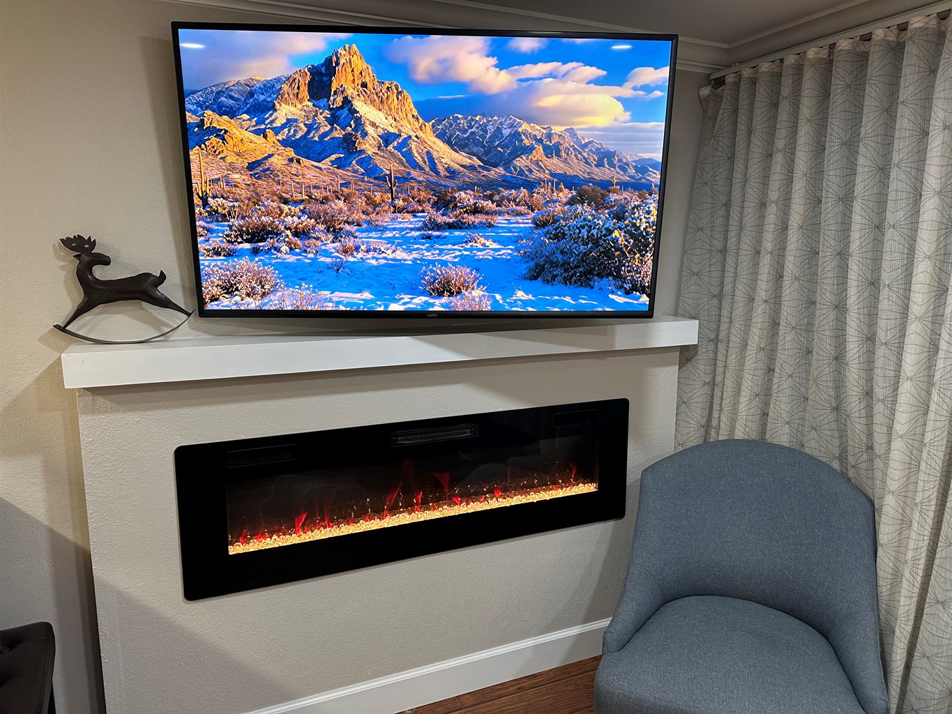 Electric Fireplace to keep you warm.  58" Smart TV for the big game. 