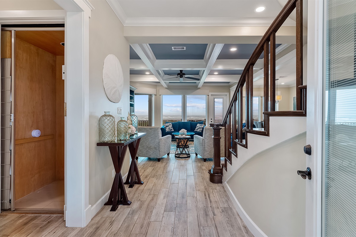 Entryway: Bright & open with direct elevator access to the 2nd and ground floors.