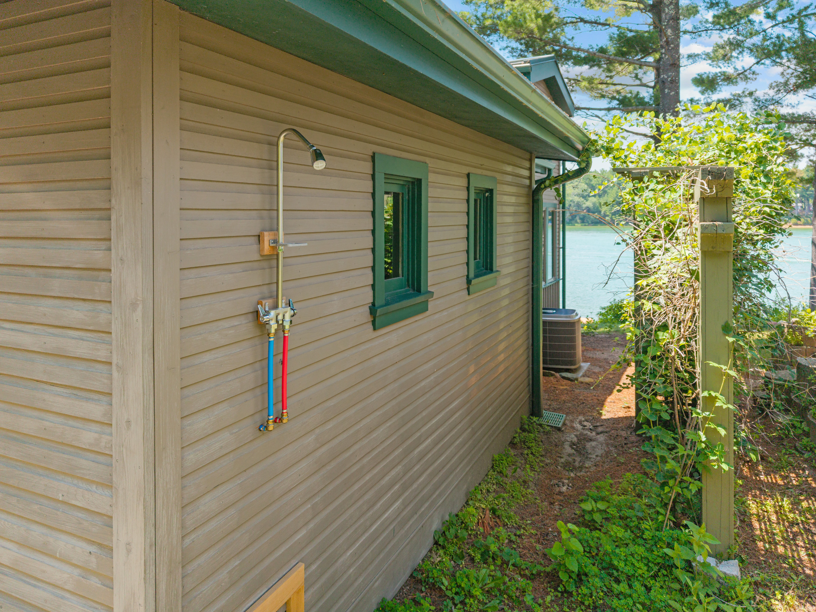Coming soon—rinse off after a day of swimming and lake adventures in the outdoor shower, just steps from the water.