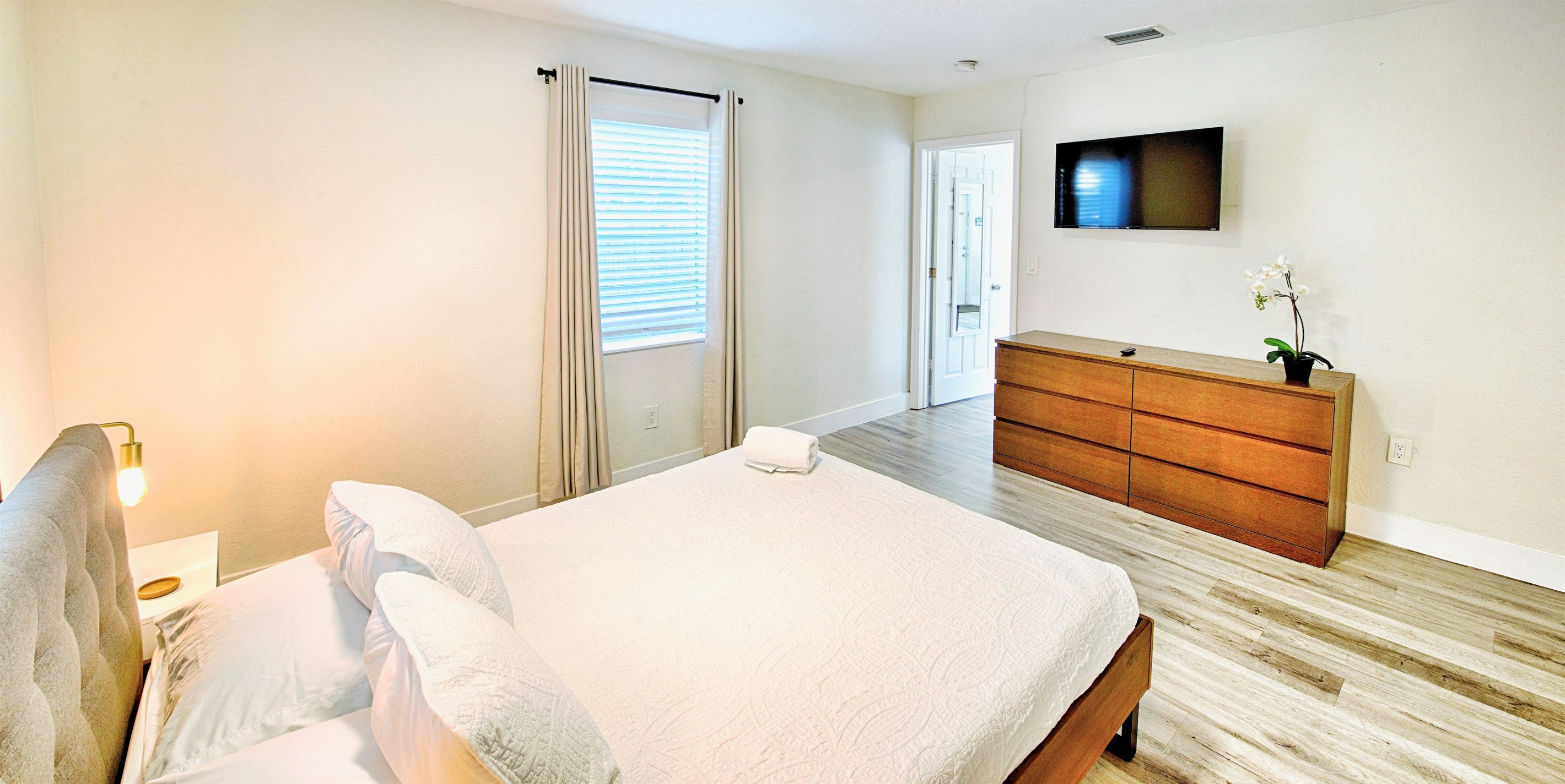 Primary bedroom with entry to living room