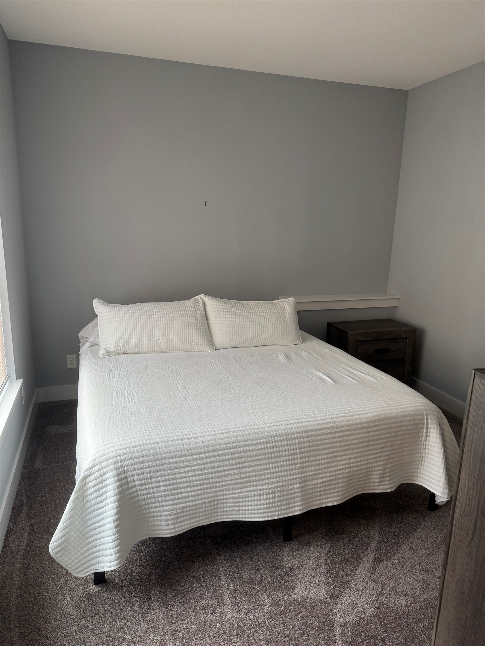 Lower level King bedroom. Shares bath with bunk/queen room.