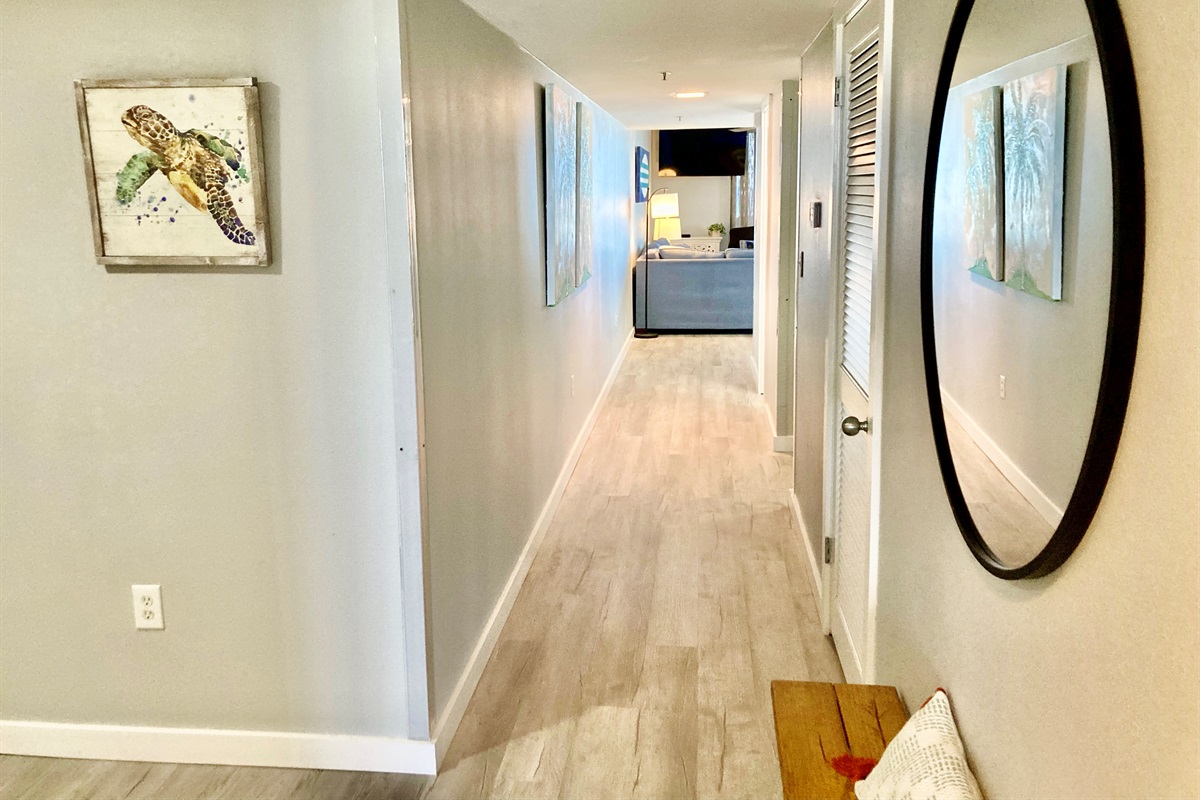 Here's the entrance.If you go left, you're headed to the living room and kitchen!