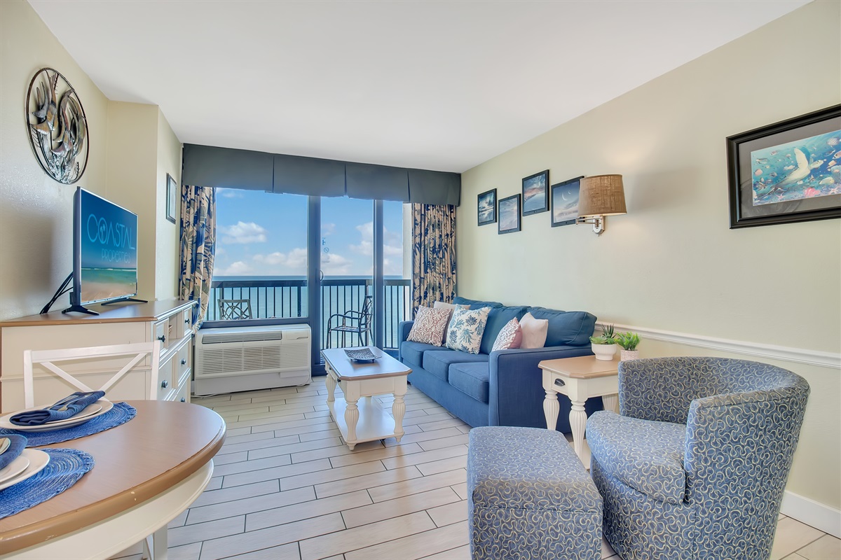 Relax in comfort with soft linens and a calm coastal vibe