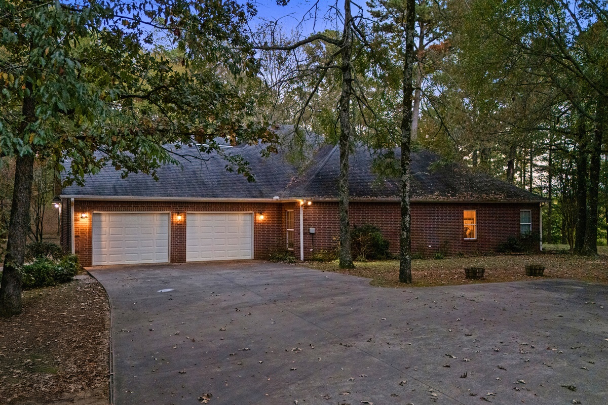 Expansive driveway and front elevation with easy parking.