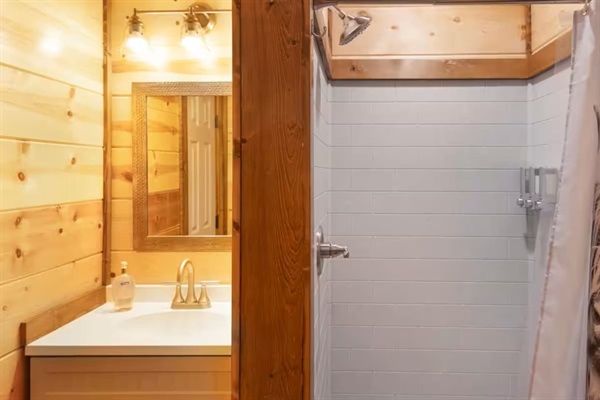 Bunk room private bathroom—convenient for groups and families.