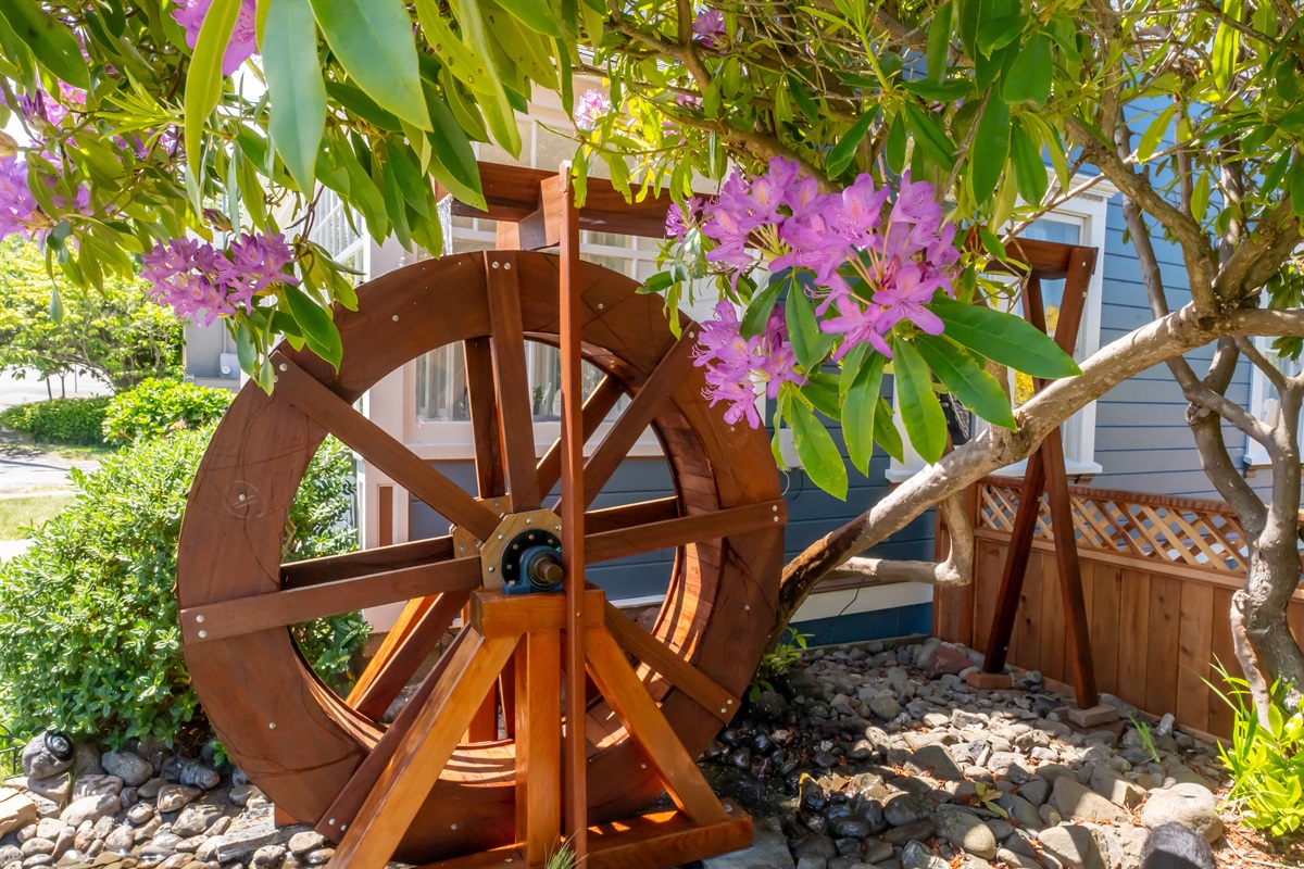 The Water Wheel Victorian from the street with landscaping
