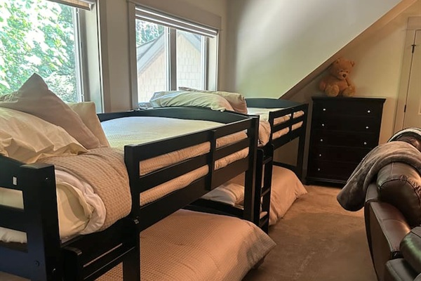 Children’s sleeping area with bunk beds.