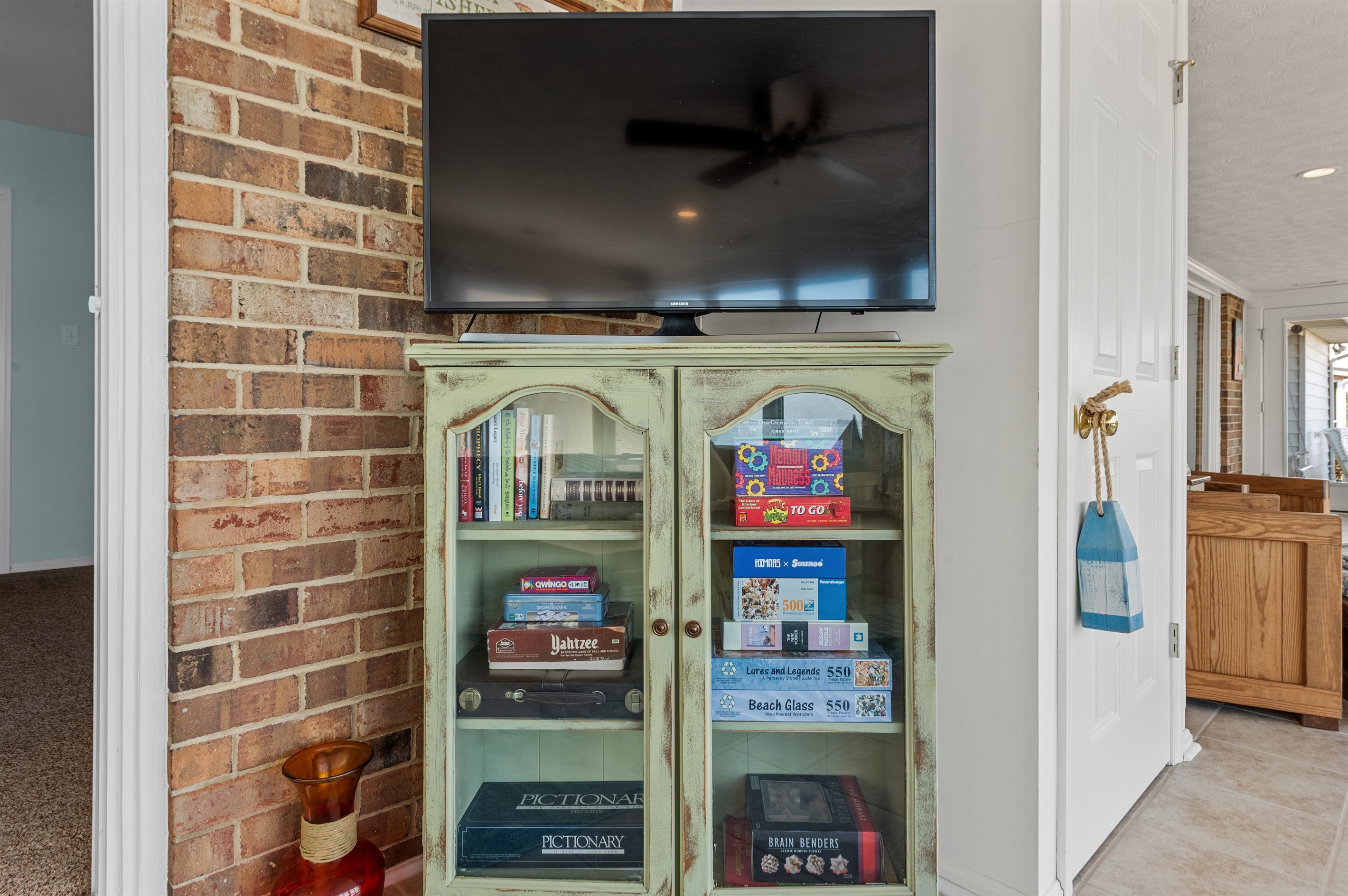 Entertainment Haven: Enjoy game nights and movie marathons with comfy decor and a large TV!