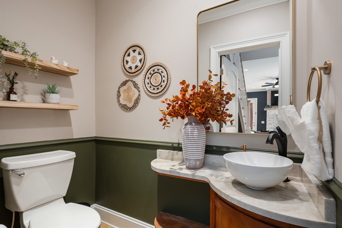 Bathroom with modern finishes and clean design - functional and well-appointed for group stays