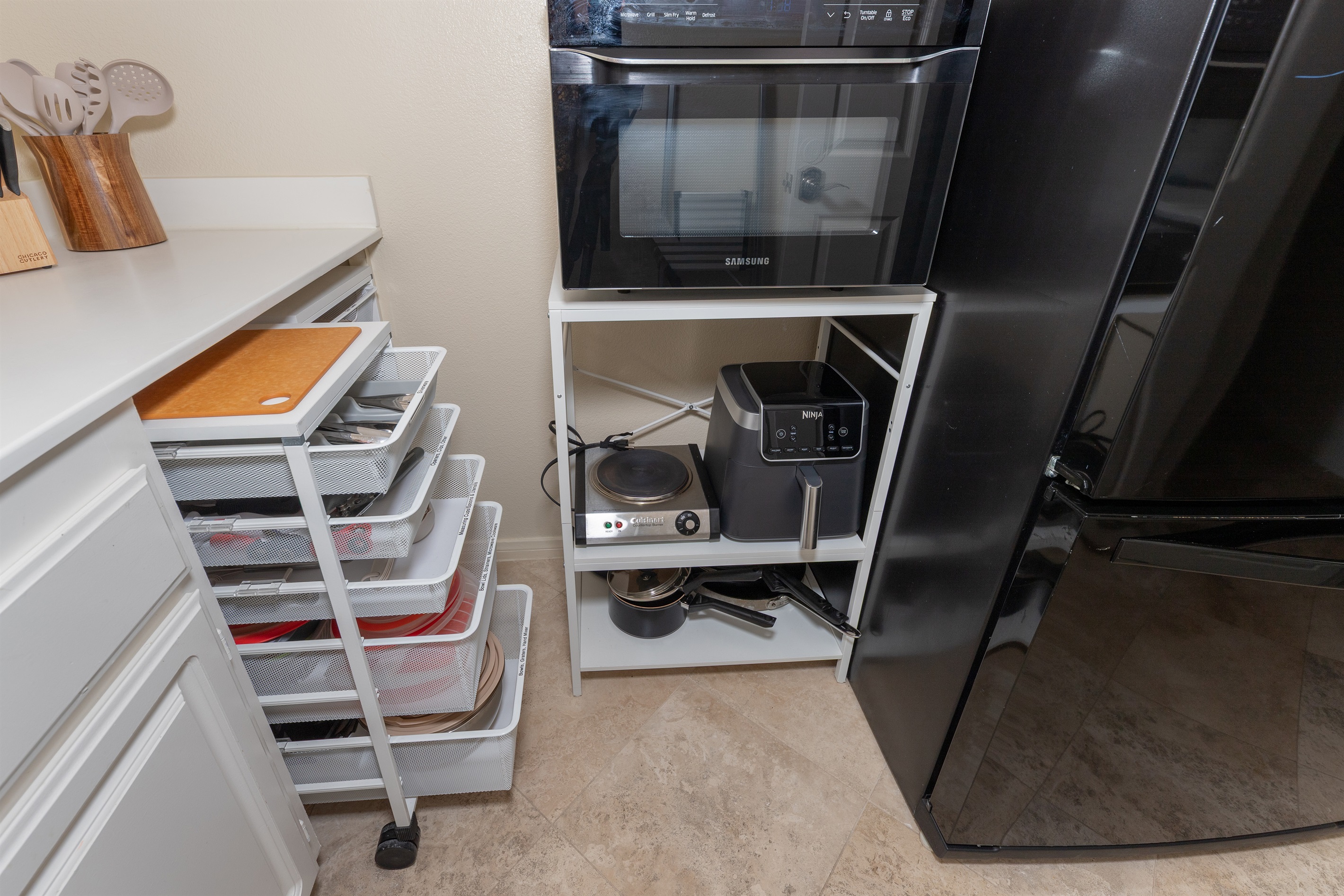 Cooking setup with air fryer, hot plate, and essentials