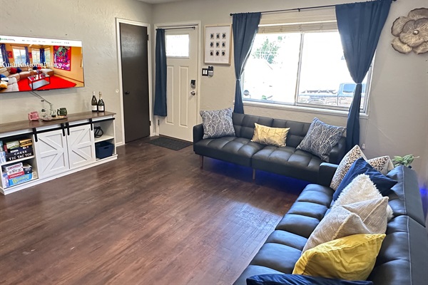 Gather the family in our inviting living room with plush couches and a TV for quality bonding time.