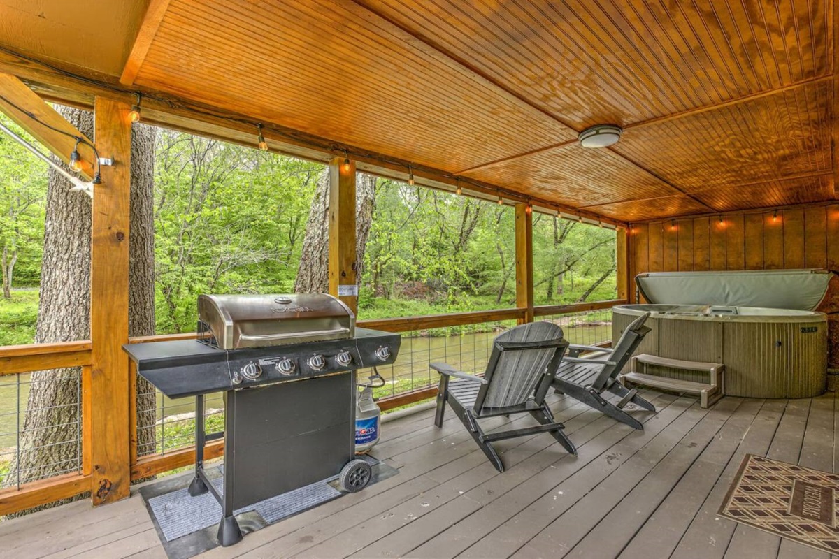 Grill and hang out on the back deck overlooking Hemptown Creek.