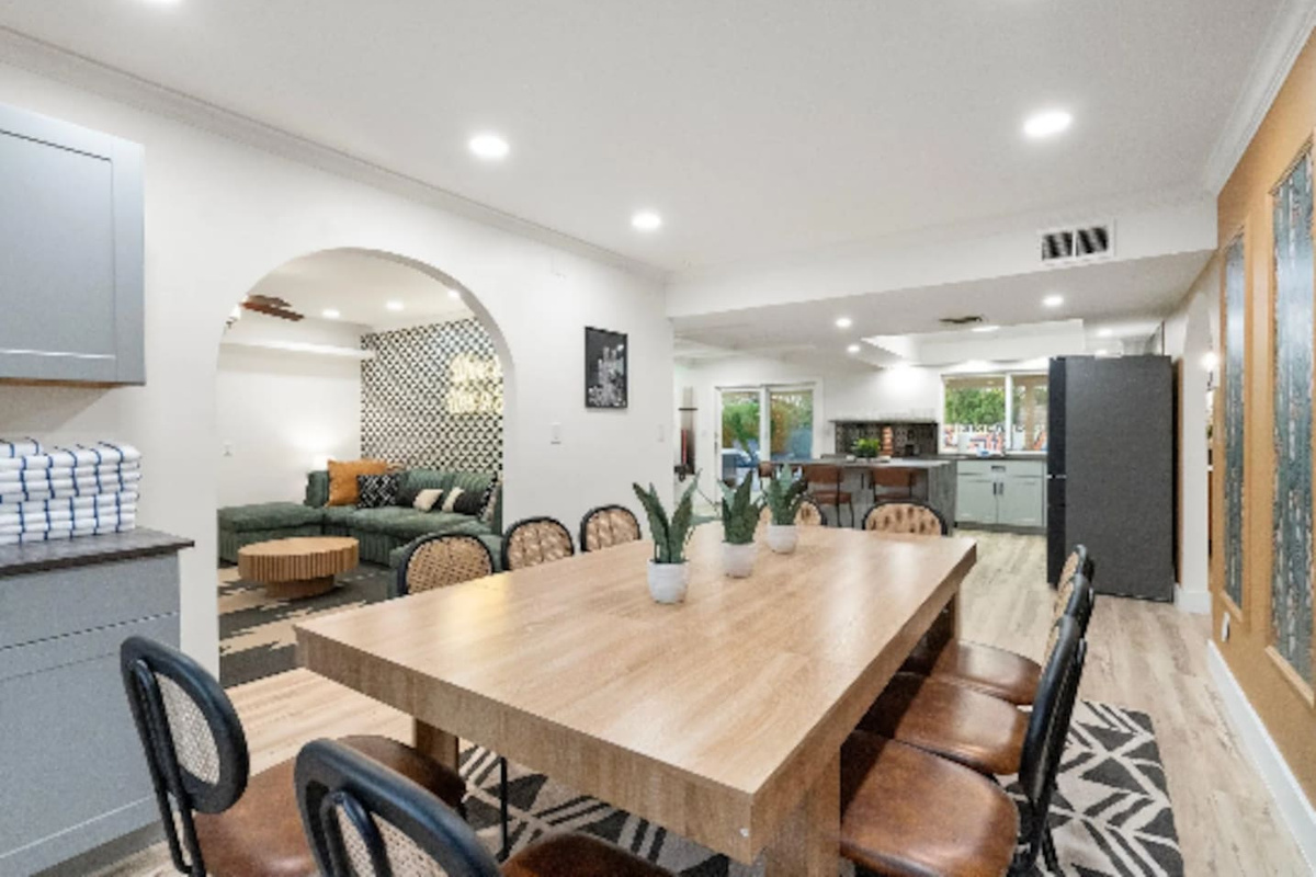 This table sits right at the heart of the home, with the kitchen on one side and the lounge just steps away. Whether it's a big group breakfast or a slow evening in, everyone stays connected without missing a beat.