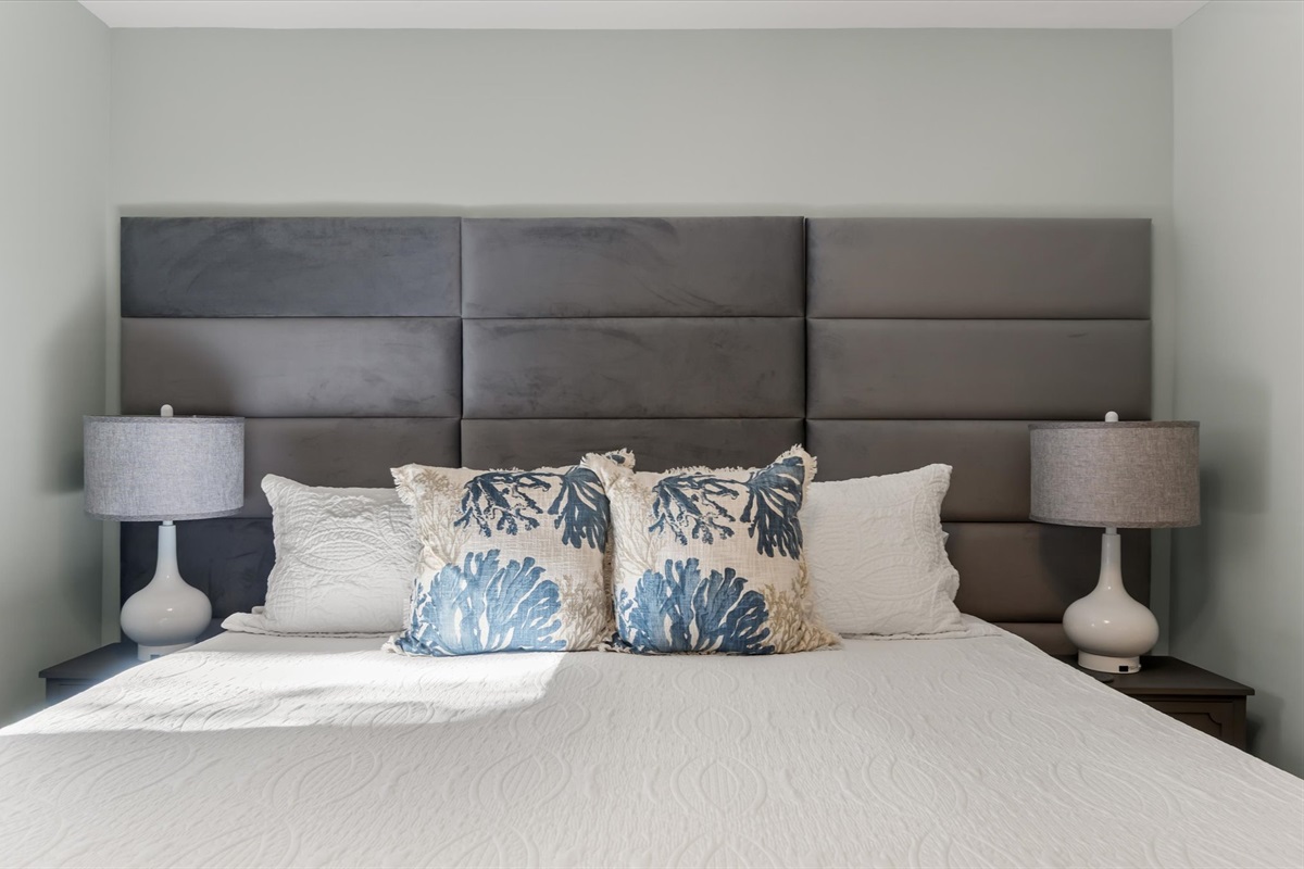 Primary suite with king bed and full bathroom