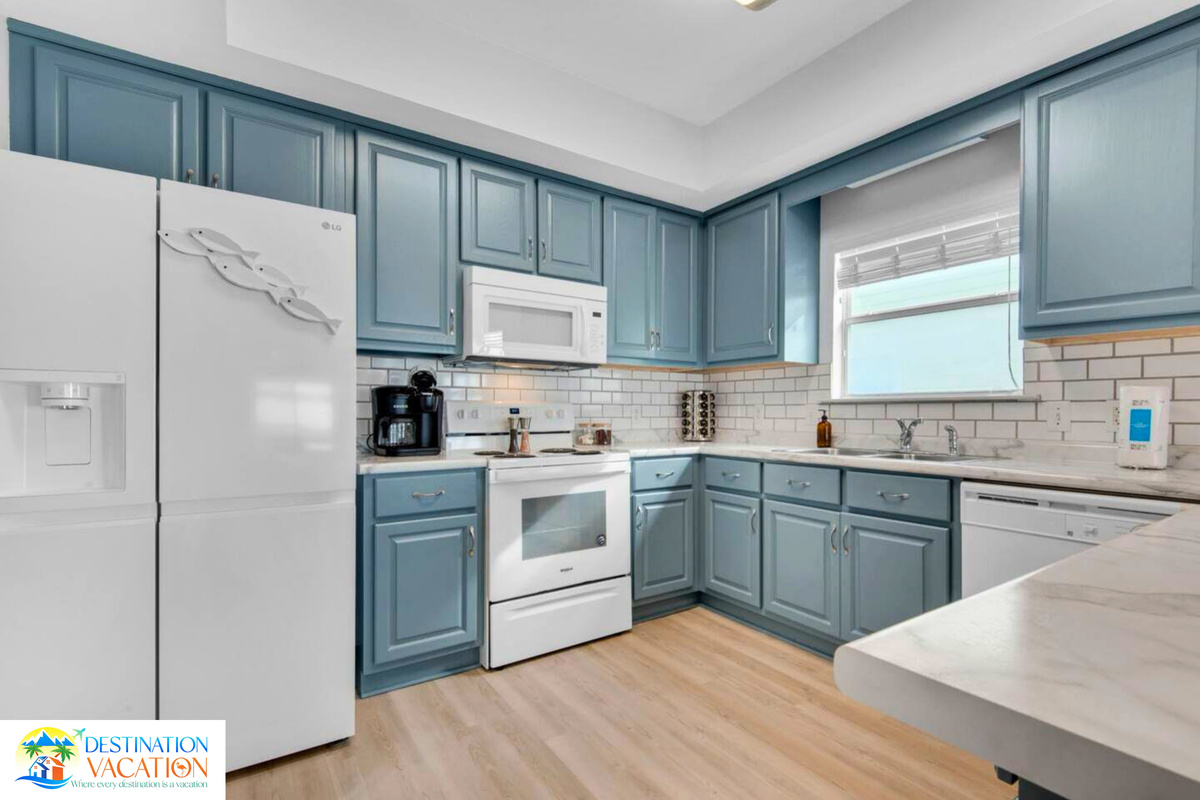 Charming coastal kitchen with everything you need.