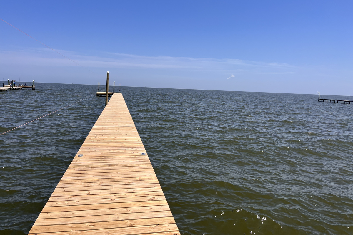 Take full advantage of our spectacular 150-foot shared pier, which serves as the ultimate destination for fishing, crabbing, or simply enjoying the peaceful waterfront atmosph