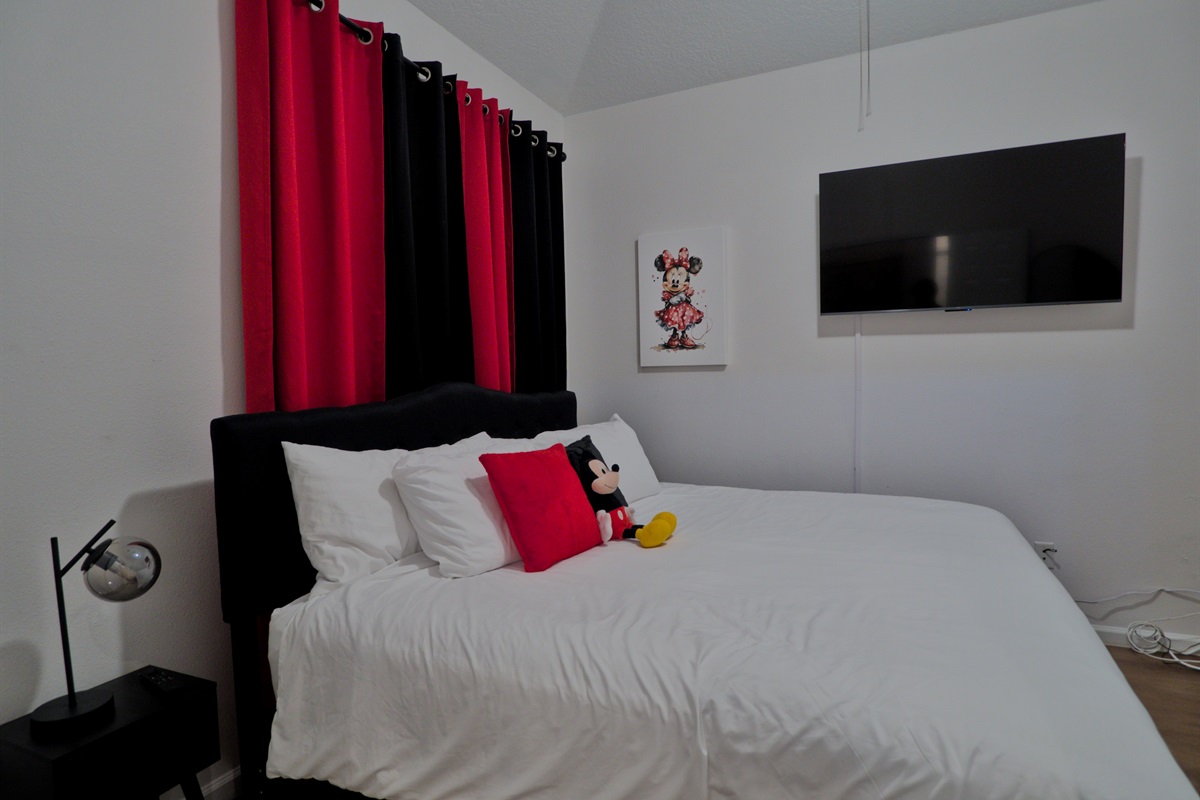 Mickey and Minnie room with king bed.