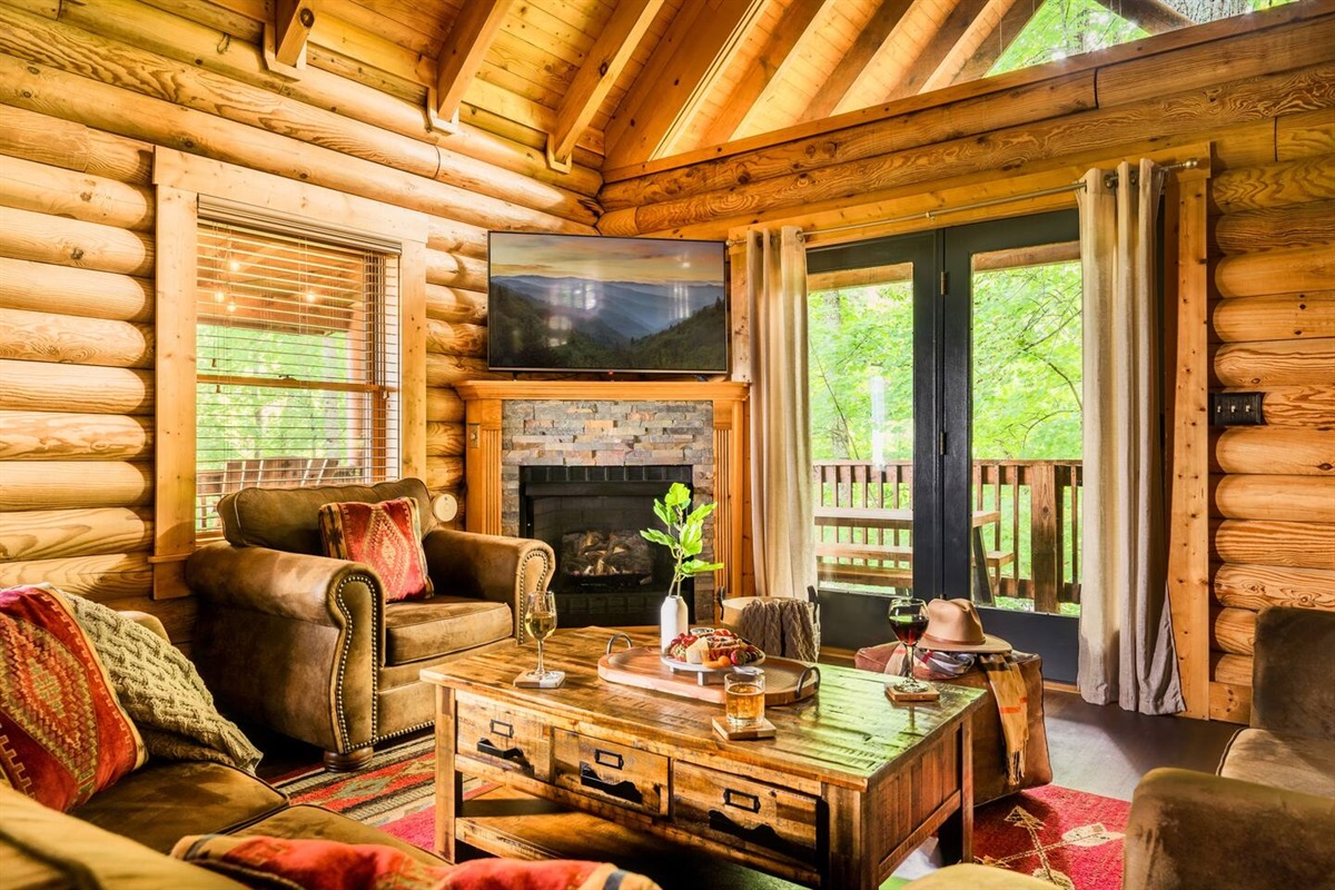 Enjoy a cup of coffee and take in the mountain and forest views from the living room. Gas Fireplace (operational October-April)