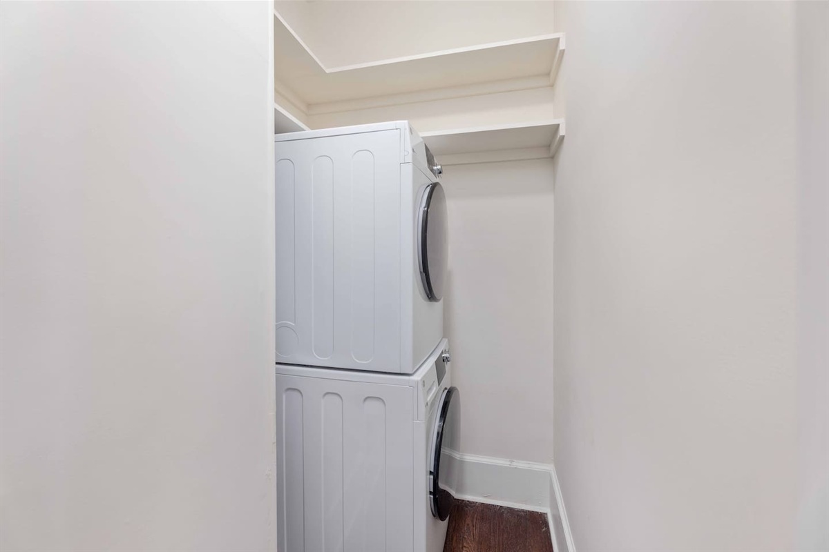Washer/dryer unit accessible through the kitchen. 