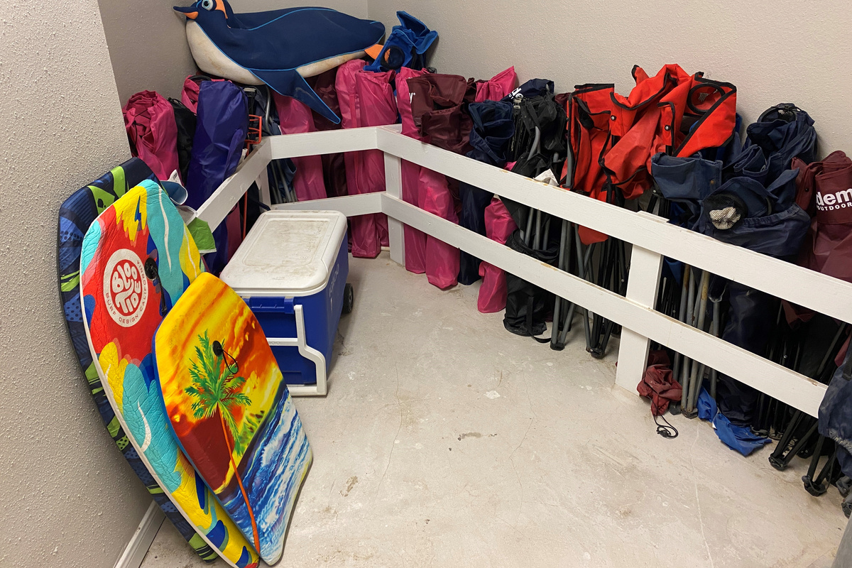 Ready to go to the beach? Grab some chairs and sand toys from the storage closet