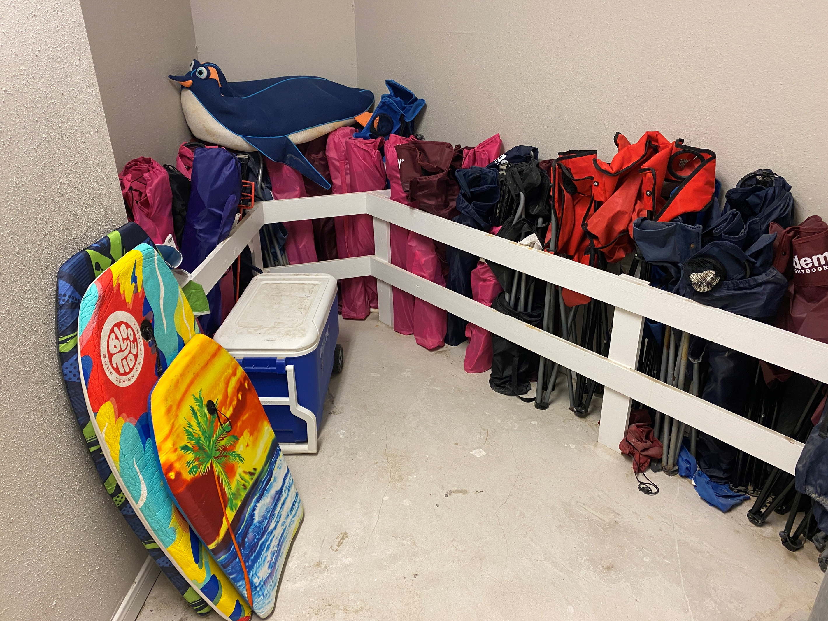 Ready to go to the beach? Grab some chairs and sand toys from the storage closet
