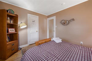 Bed footer in blueberry room