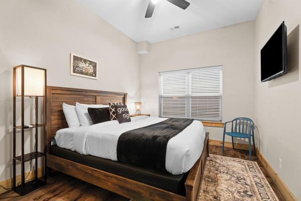 King bedroom with en suite full bathroom. Lower level.