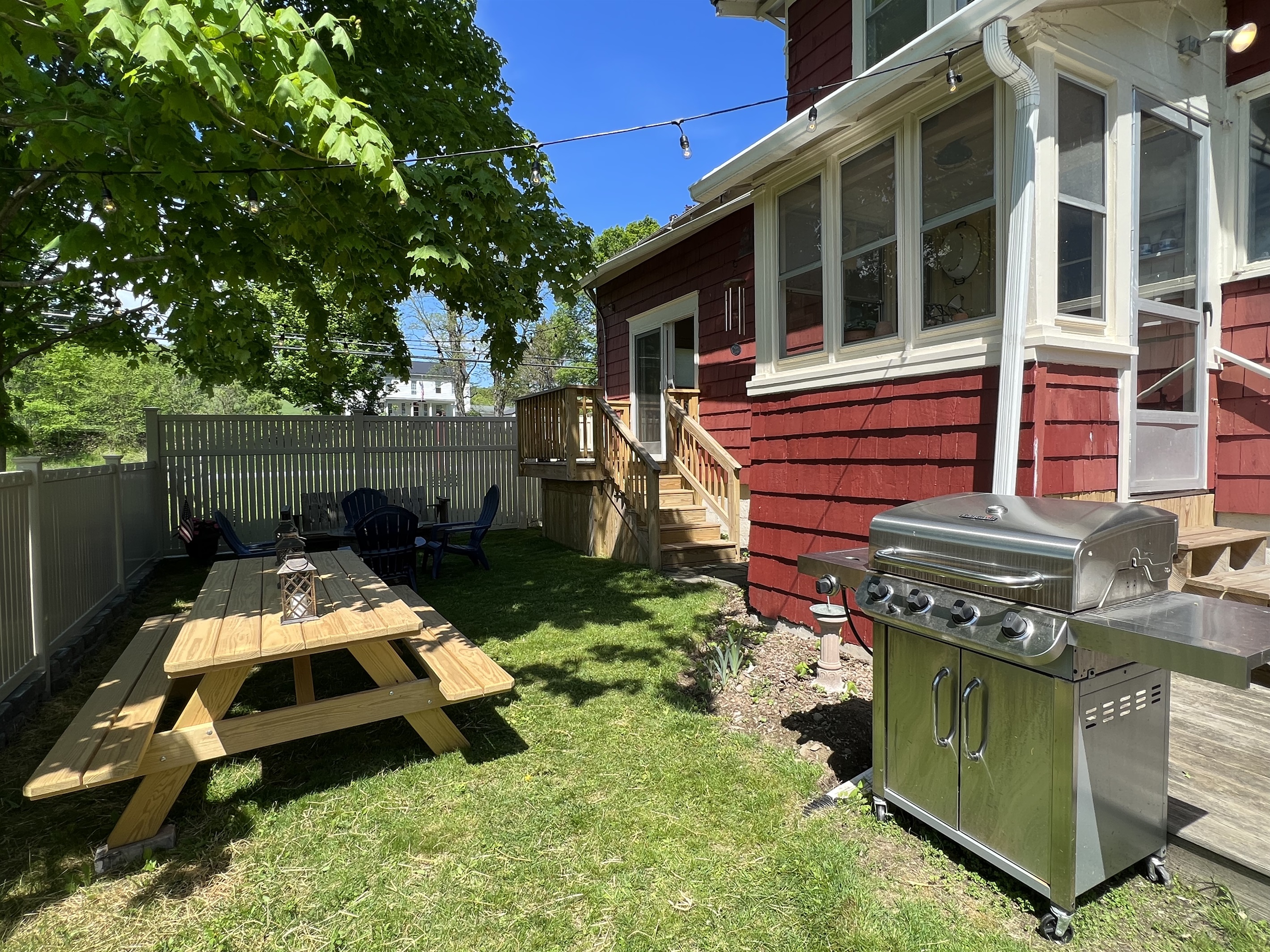 Backyard w/ gas grill and fire pit