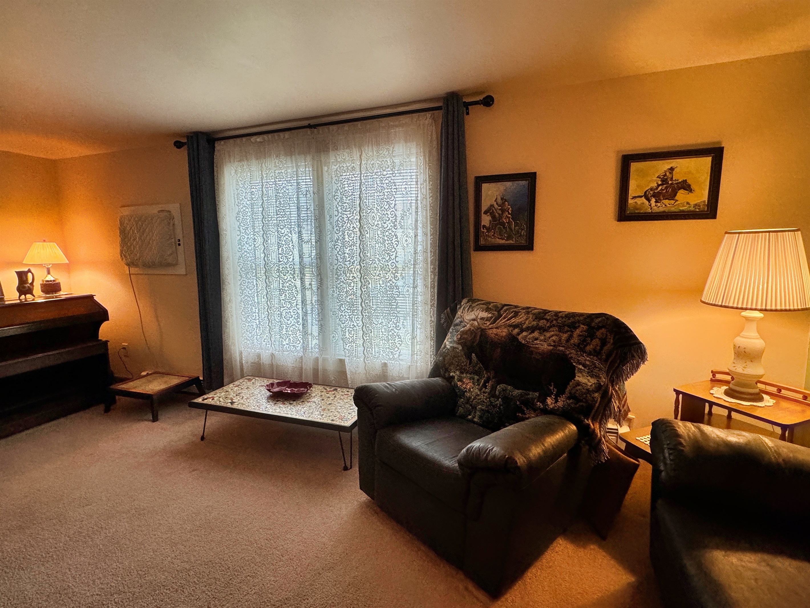Living room between twin bed room and queen room.