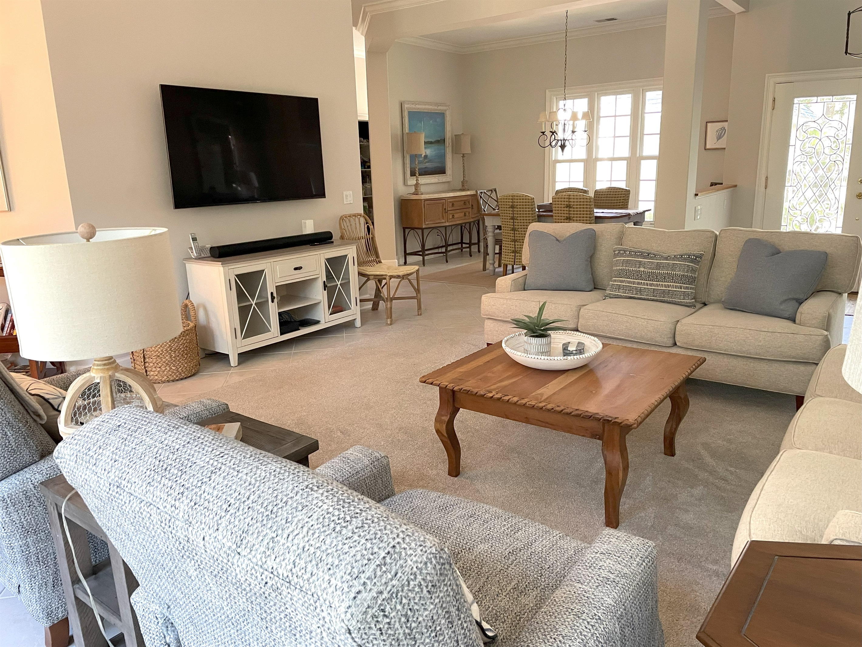 65" HD television in great room, open to dining room