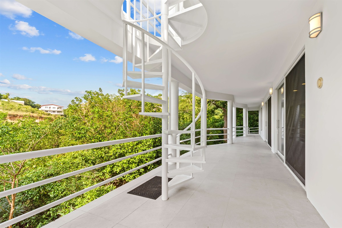 Take the spiral staircase leads to the lowest level where you'll find a full apartment