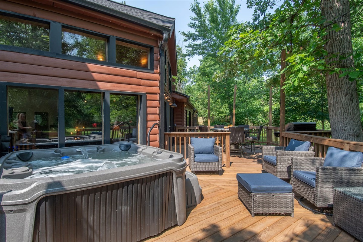 The 7 person hot tub is equipped with a convenient cover lift.