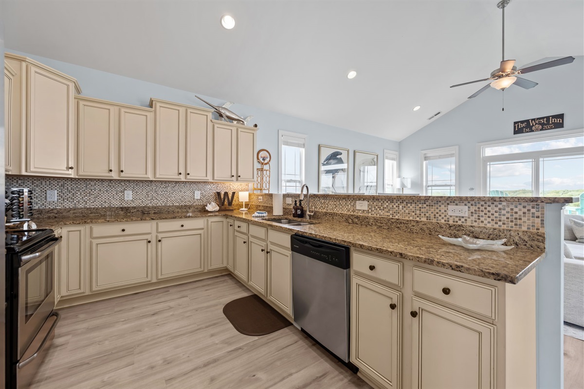 Beautiful granite spans the entire kitchen, providing ample space for the whole group to pitch in on dinner- never too many cooks in this kitchen! 