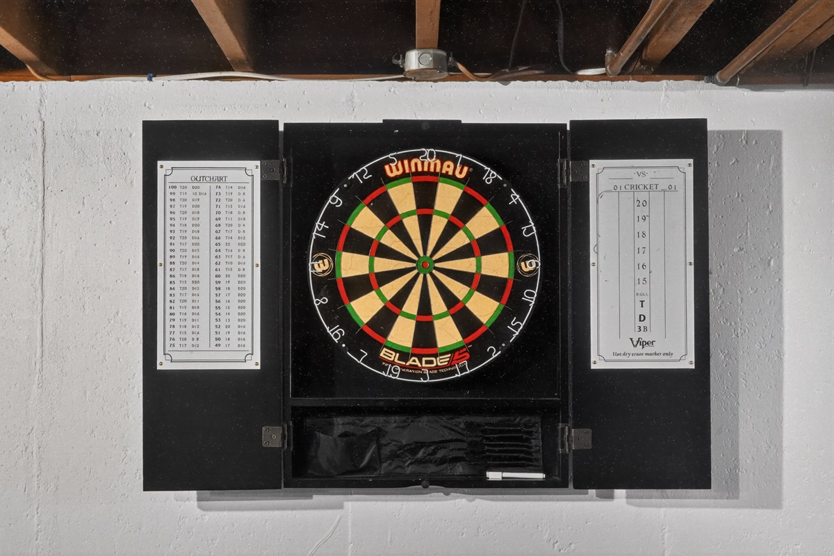 Unwind and have fun in the basement game area with darts!