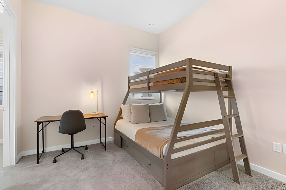 A desk and chair available, perfect for catching up on work or planning your next excursion!