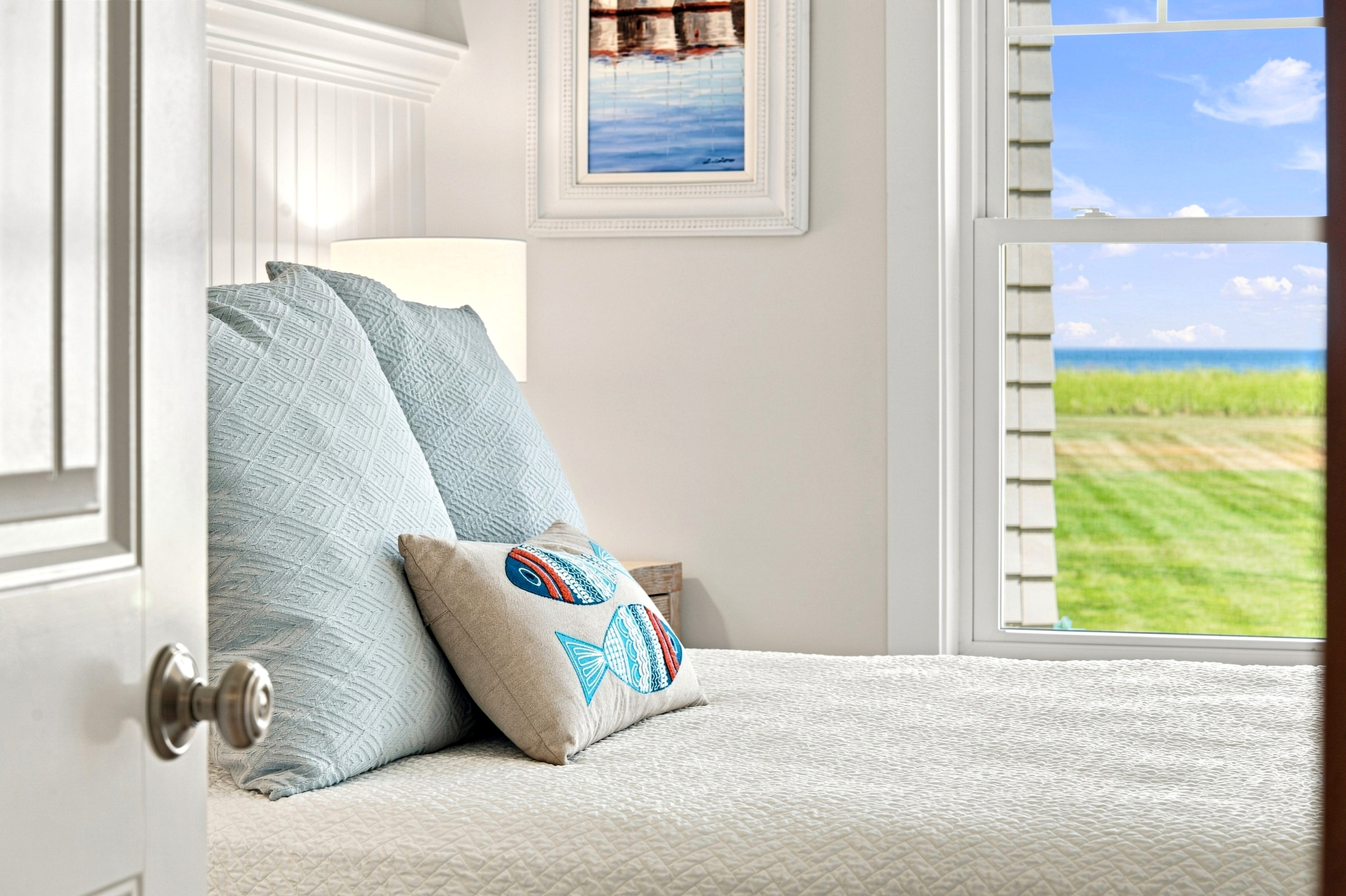 Ocean views right from bed bring the coastal setting into your private retreat.