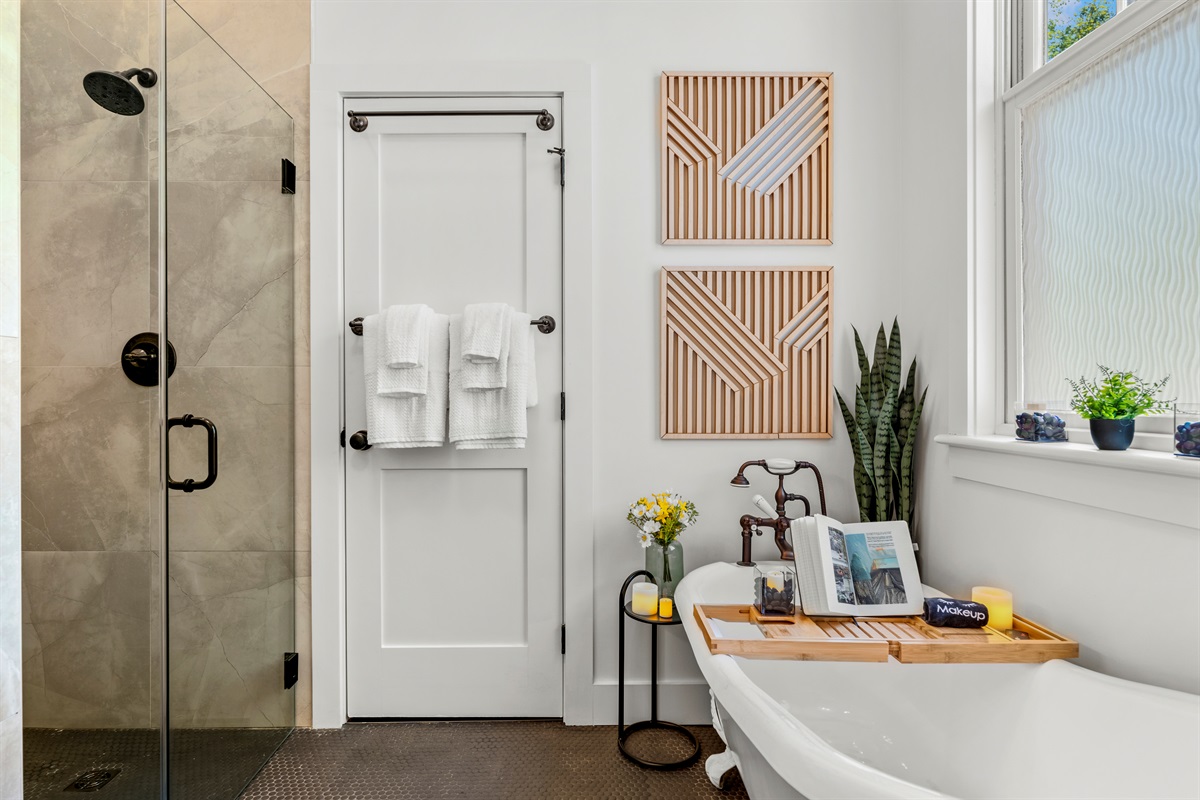 Your personal spa awaits with a vintage-style clawfoot tub, zero-entry walk-in shower, and calming natural touches to melt your stress away.
